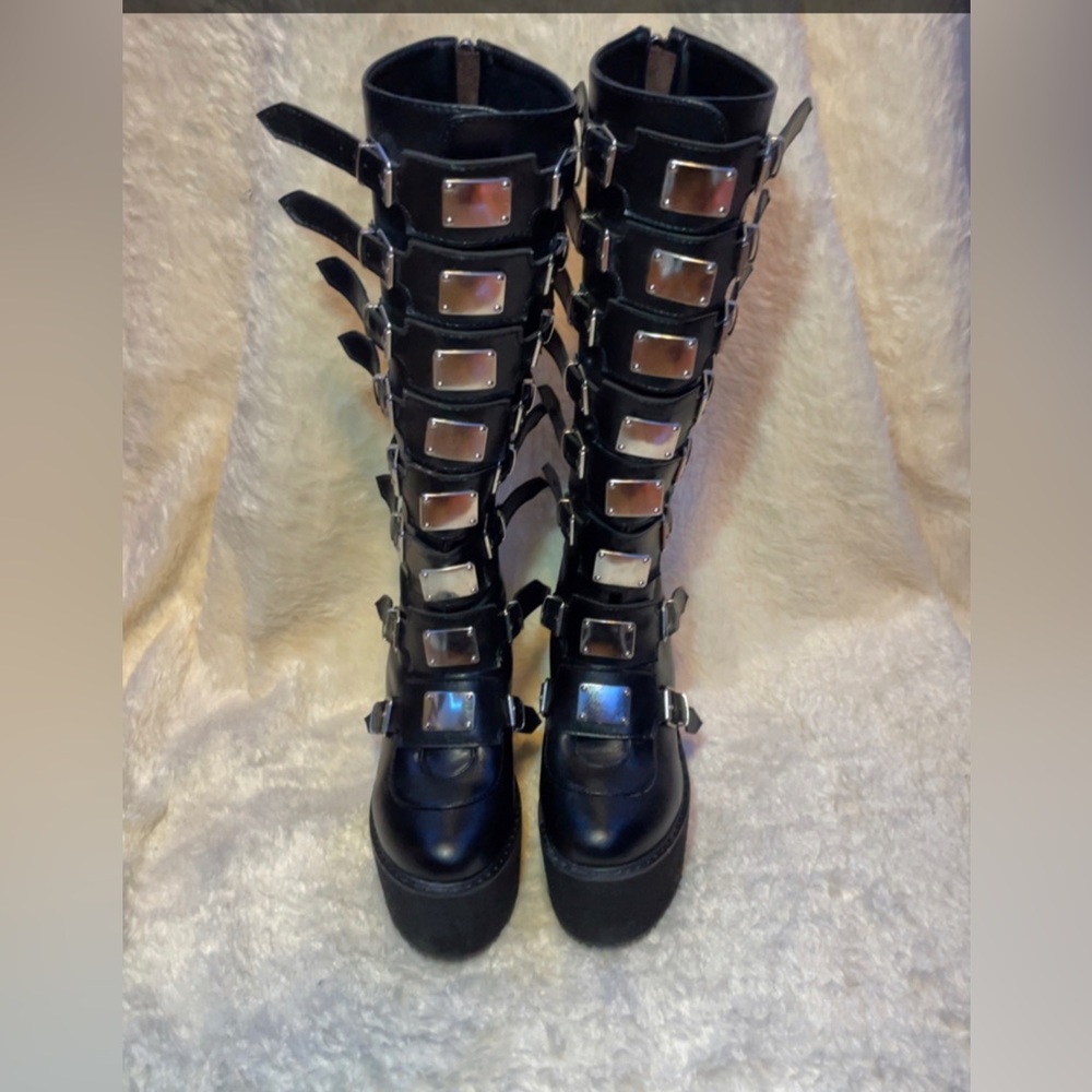 Black almost knee high platform boots with multiple buckles, size 5 in women’s